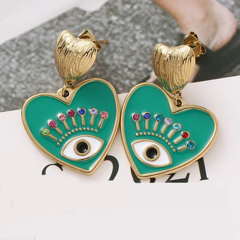 Pendientes de acero inoxidable eyes chapado en oro de 14k