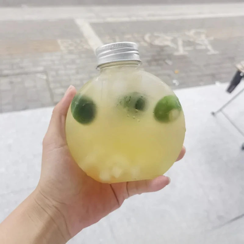 Botellas de plástico con forma de bola de 300ml botella de agua de plástico con tapas