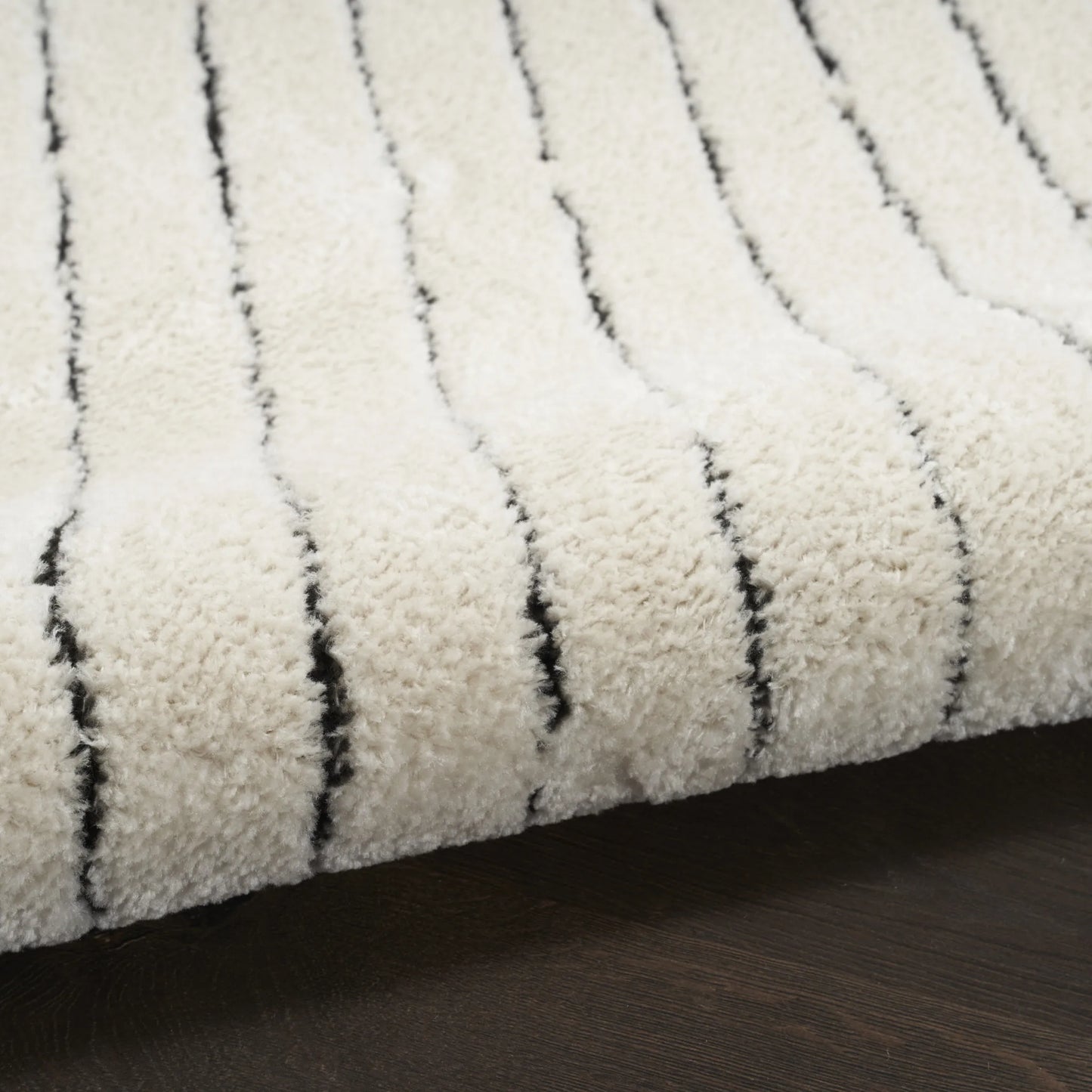 Wool runner rug with boho-style tufts 