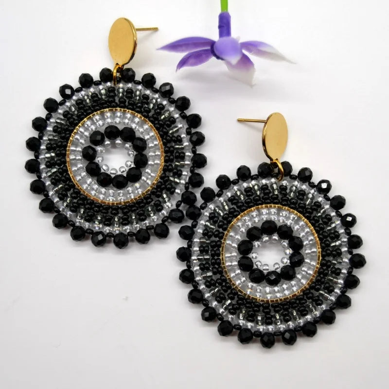 Pendientes de cuentas de arroz retro de moda bohemia con cristal ahuecado tejido a mano