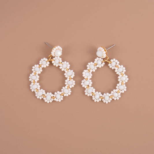 Handmade white beaded flower dangle earrings
