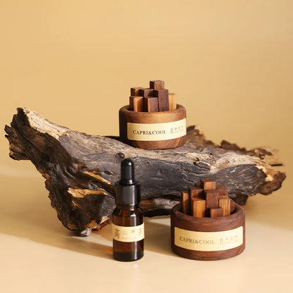 Aceite esencial natural con gotero de vidrio Palos de madera de nogal negro