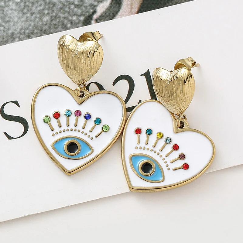 Pendientes de acero inoxidable eyes chapado en oro de 14k