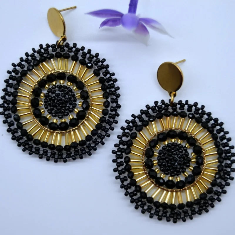 Pendientes de cuentas de arroz retro de moda bohemia con cristal ahuecado tejido a mano