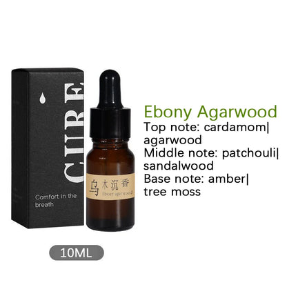 Aceite esencial natural con gotero de vidrio Palos de madera de nogal negro