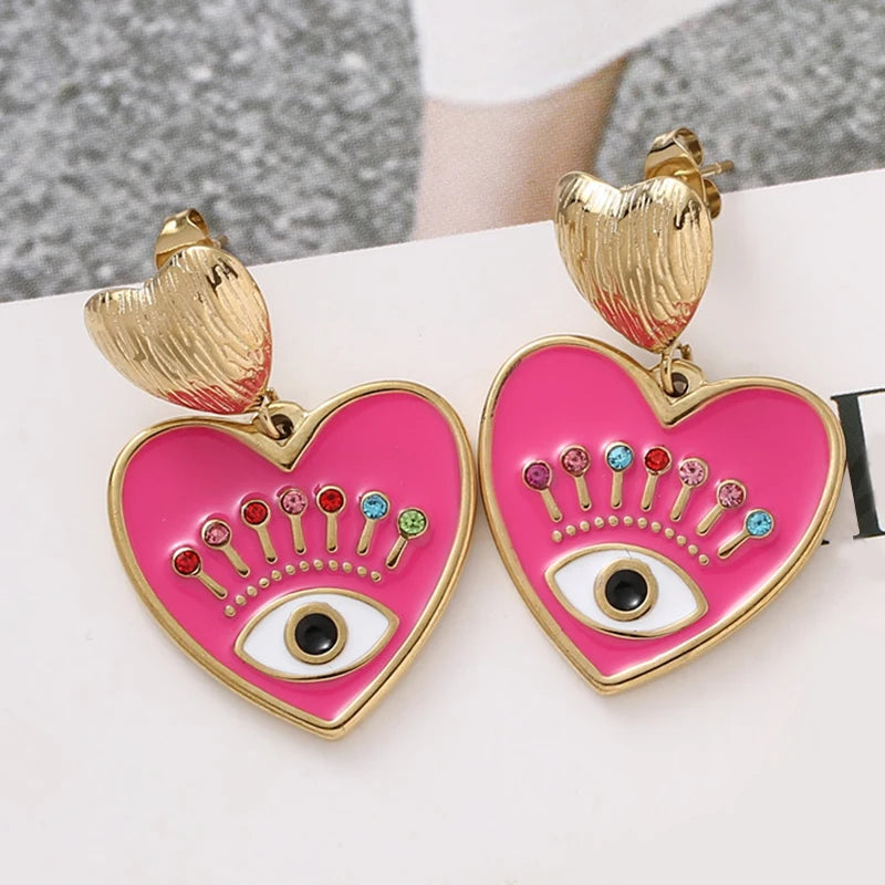 Pendientes de acero inoxidable eyes chapado en oro de 14k