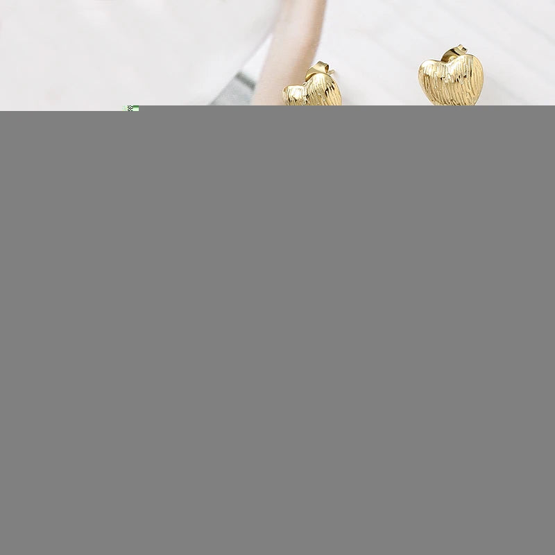 Pendientes de acero inoxidable eyes chapado en oro de 14k