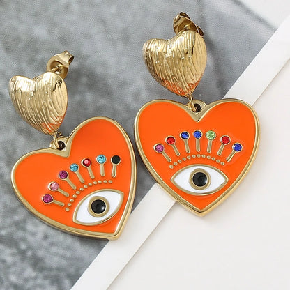 Pendientes de acero inoxidable eyes chapado en oro de 14k
