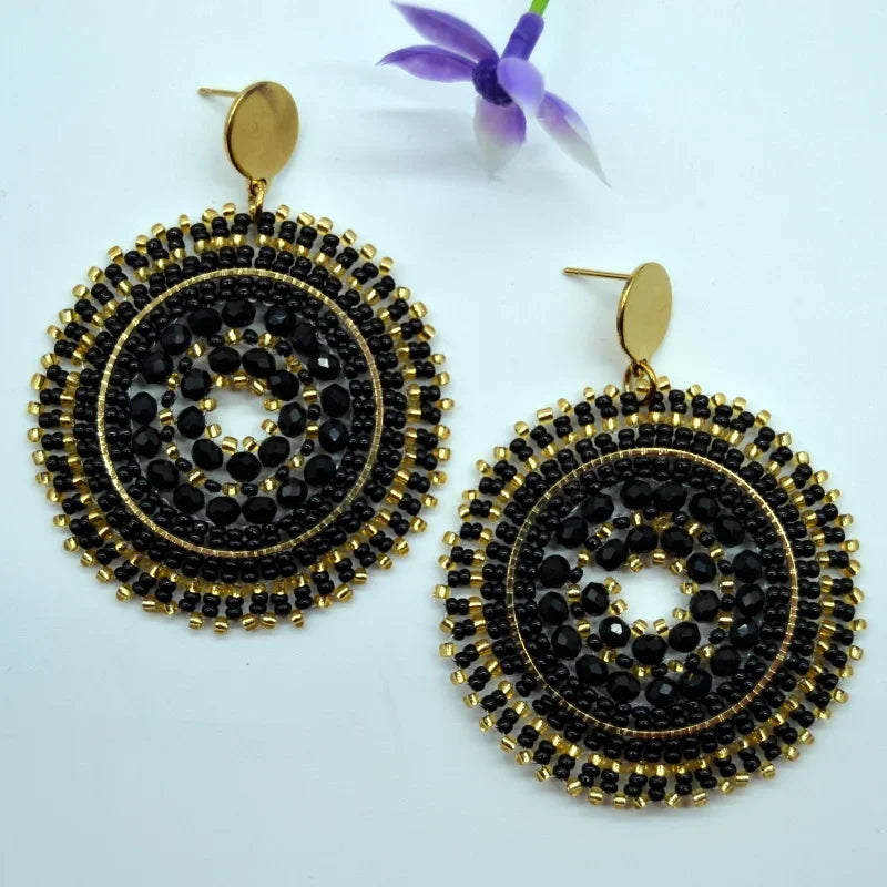 Pendientes de cuentas de arroz retro de moda bohemia con cristal ahuecado tejido a mano