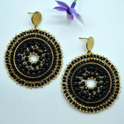 Pendientes de cuentas de arroz retro de moda bohemia con cristal ahuecado tejido a mano