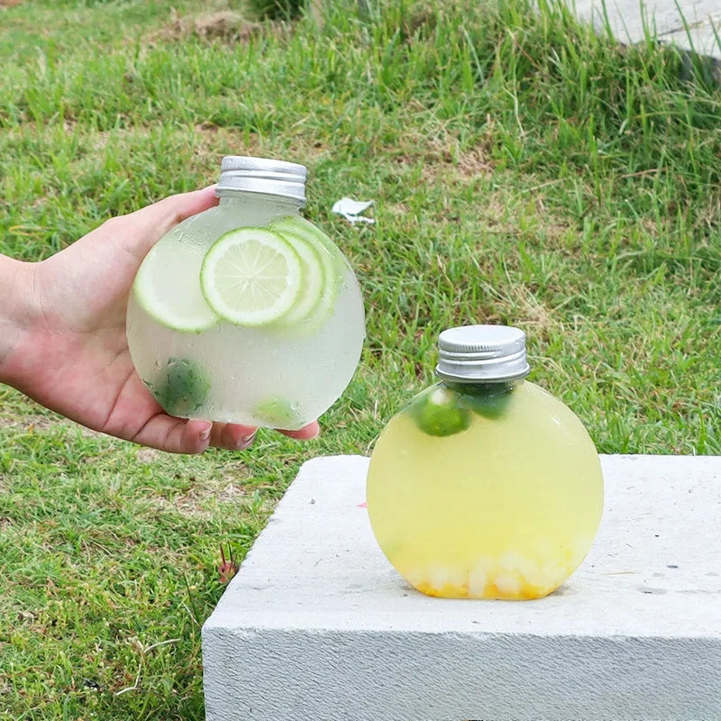 Botellas de plástico con forma de bola de 300ml botella de agua de plástico con tapas