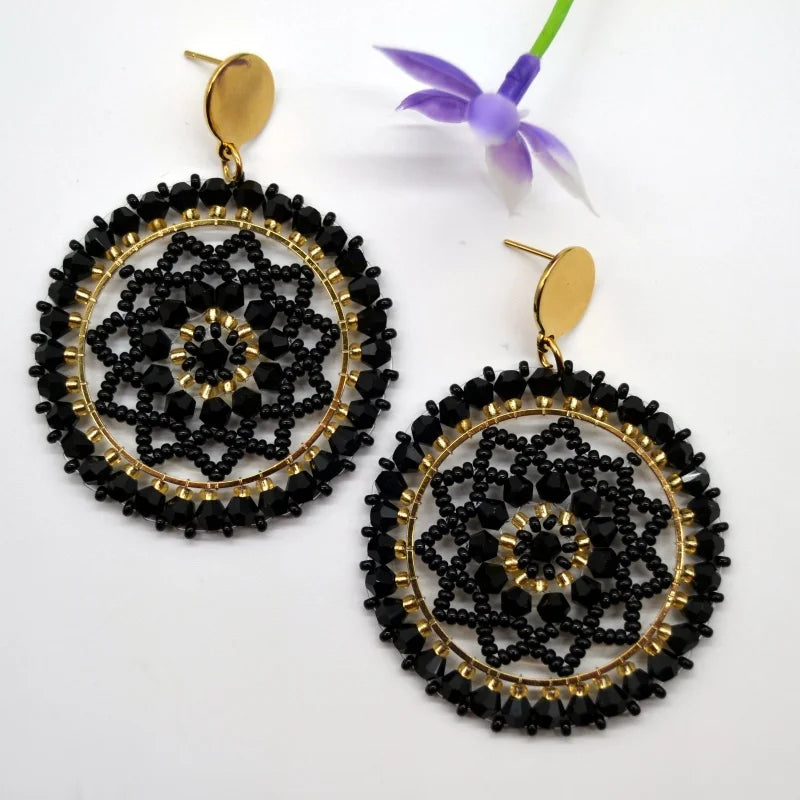 Pendientes de cuentas de arroz retro de moda bohemia con cristal ahuecado tejido a mano