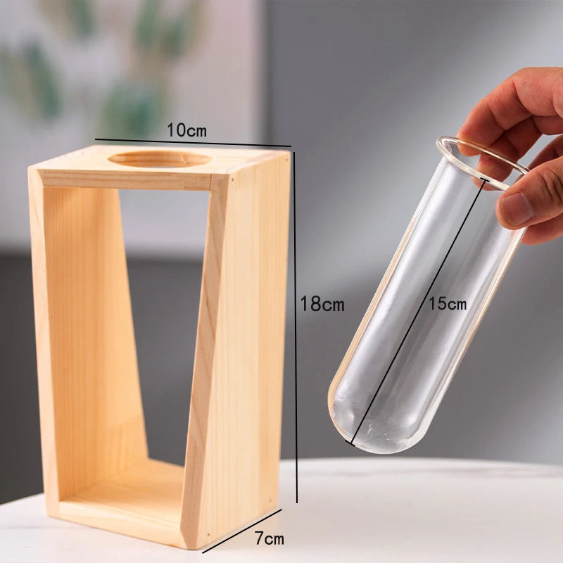 Wooden vase with a container of green ivy grown with water