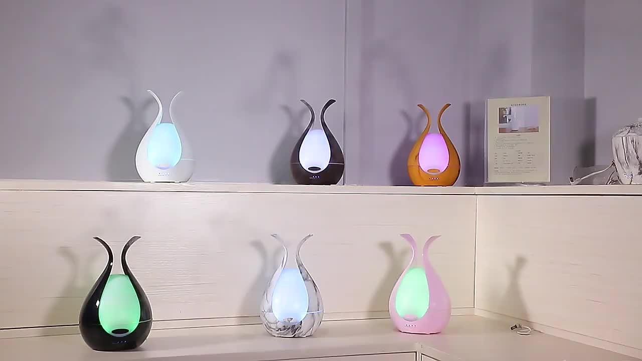 Difusor de aroma de aceites esenciales de 200 ml de capacidad con luces LED de 7 colores