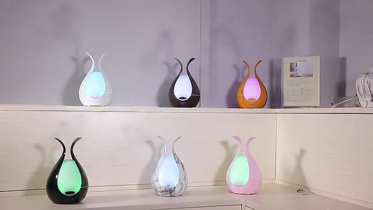 Difusor de aroma de aceites esenciales de 200 ml de capacidad con luces LED de 7 colores
